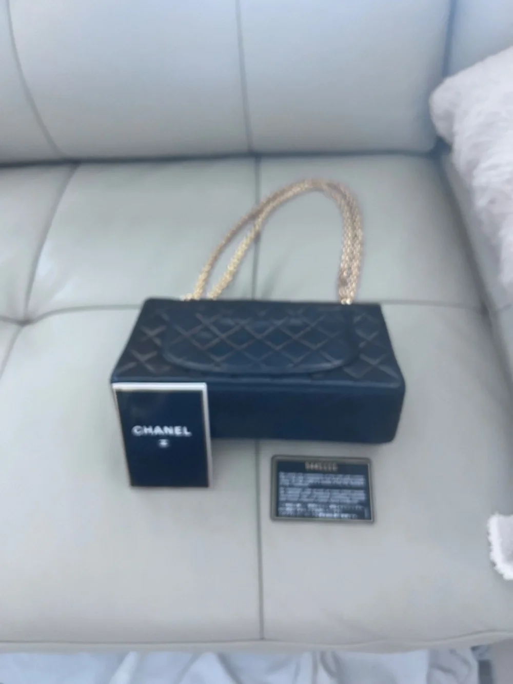 Chanel 2.55 flap bag, black calfskin and gold hardware
